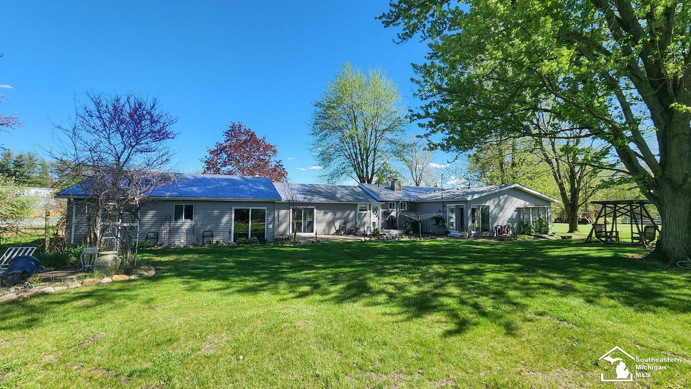 Property Photo:  9310 Oakville Waltz Road  MI 48191-9604 