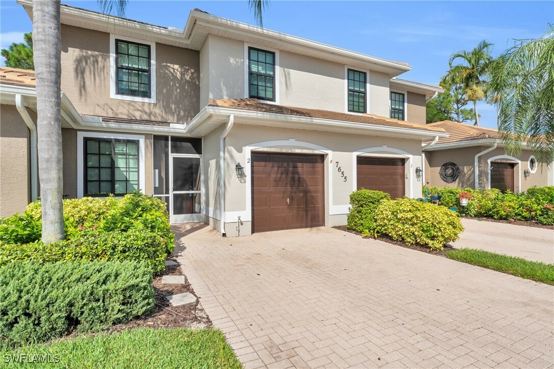 Property Photo:  7655 Meadow Lakes Drive 1002  FL 34104 