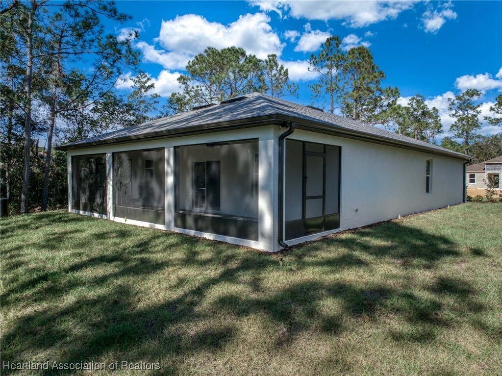 Property Photo:  8711 Capilla Street  FL 33872 