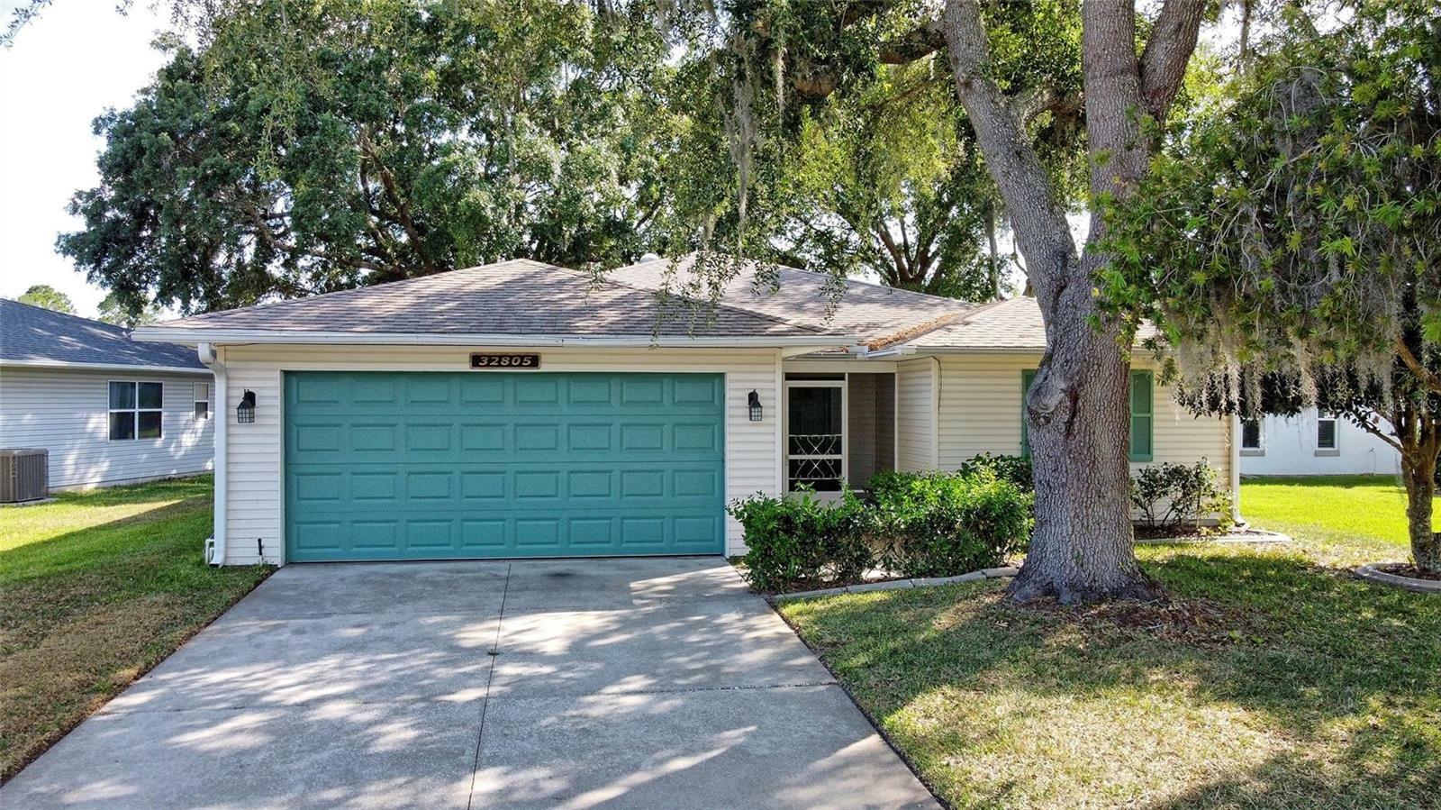 Property Photo:  32805 Oak Park Drive  FL 34748 