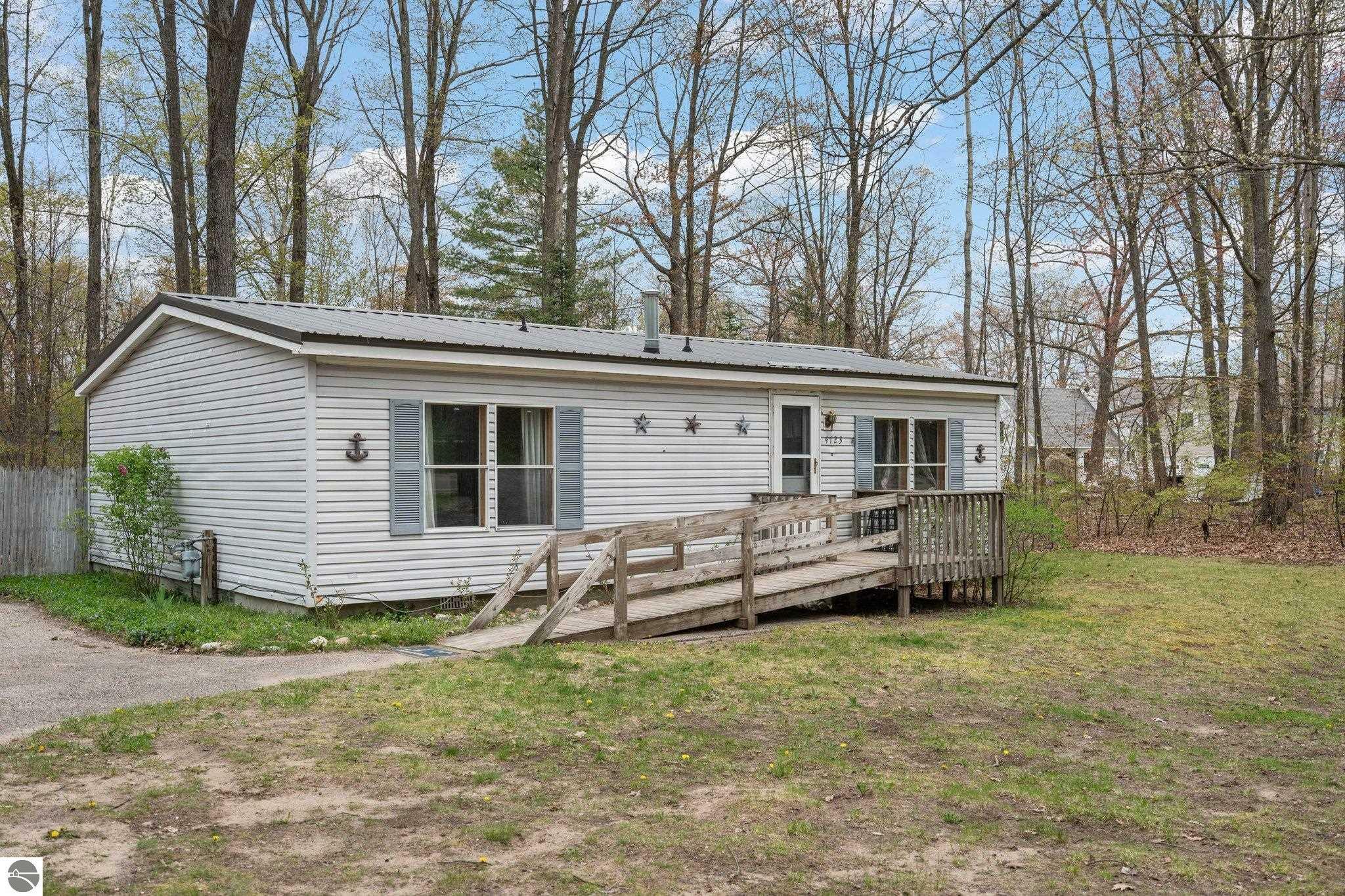 Property Photo:  4723 W Lake Mitchell Drive  MI 49601-9077 