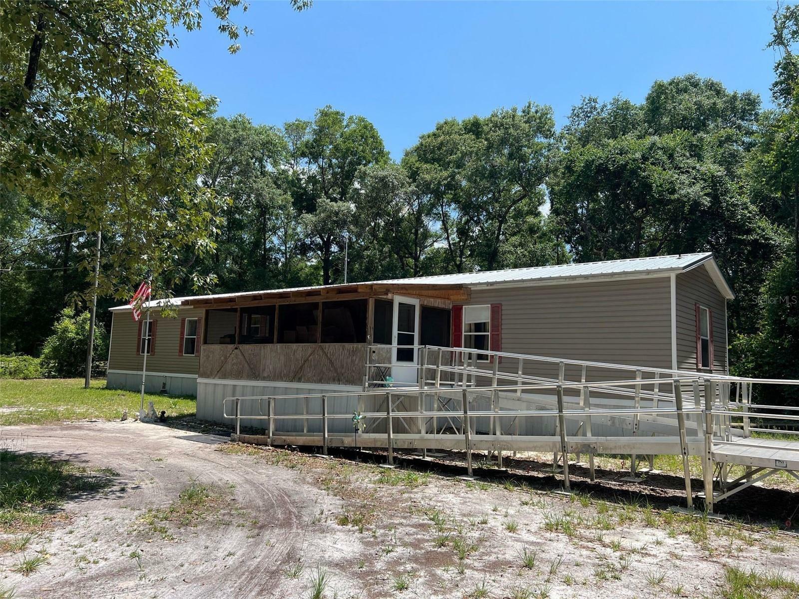 Property Photo:  7990 NW 150th Street  FL 32693 