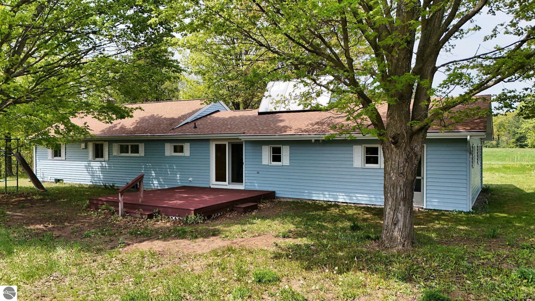 Property Photo:  6691 N Long Lake Road  MI 49685 