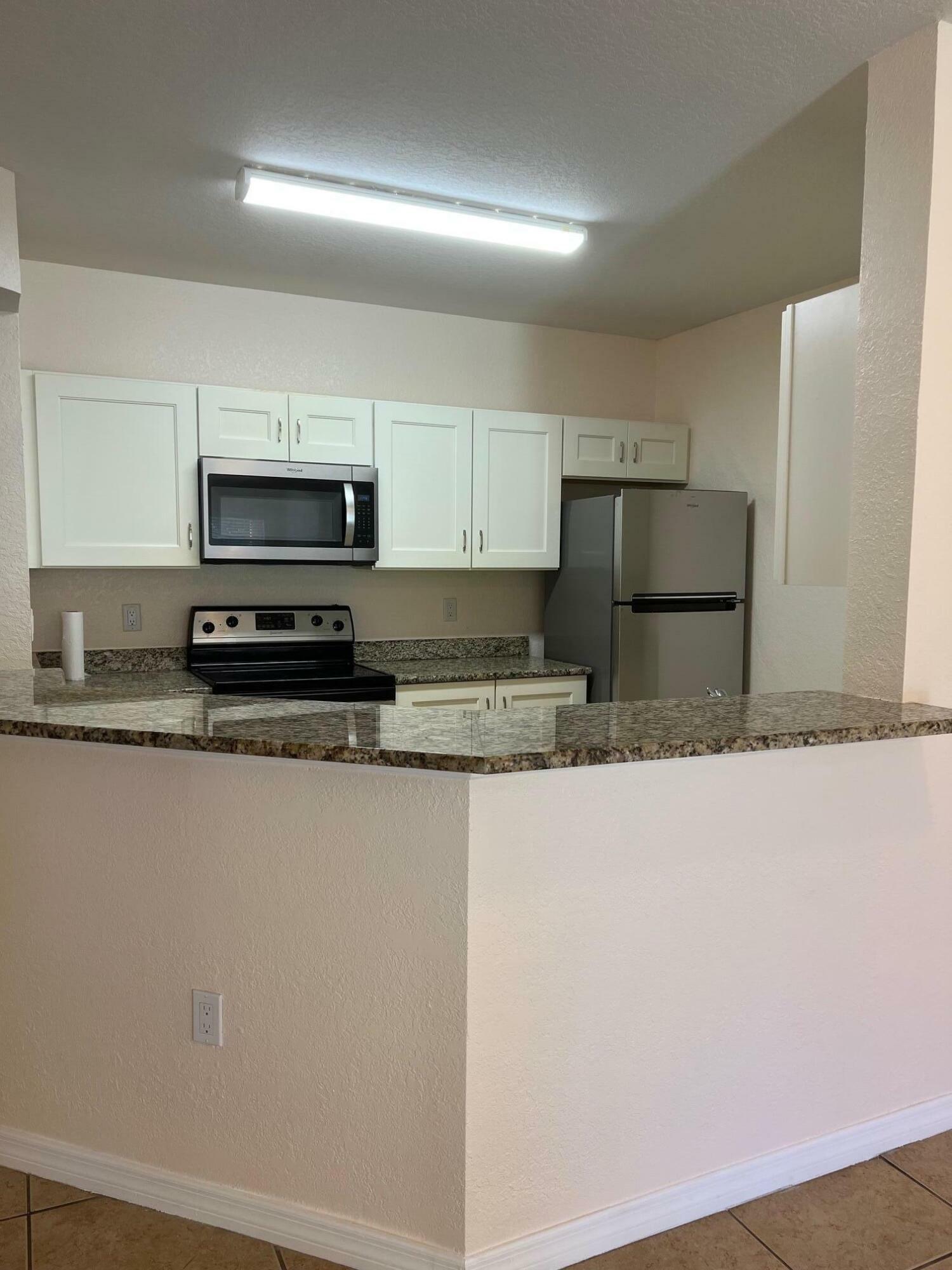 Property Photo:  138 SW Peacock Boulevard 20-102  FL 34986 