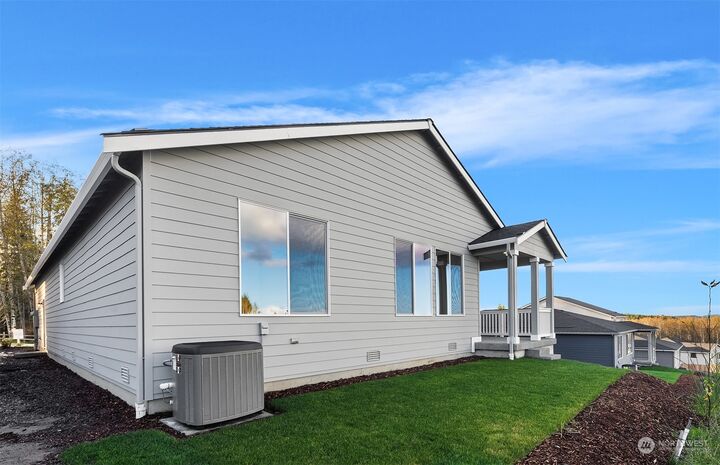 Property Photo: 23446 Arbors Terrace Road NE 50 WA 98346