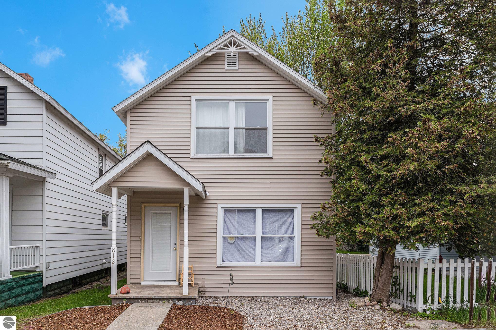 Property Photo:  812 Forest Avenue  MI 49635 