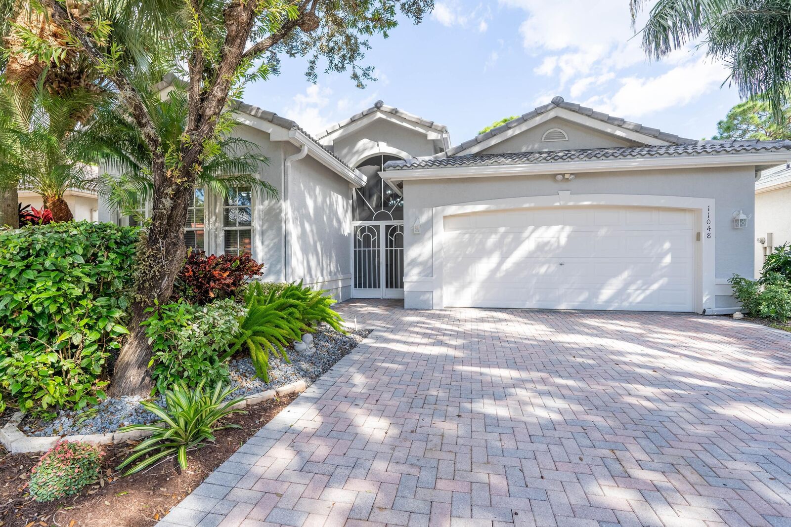 Property Photo:  11048 Manele Court  FL 33437 