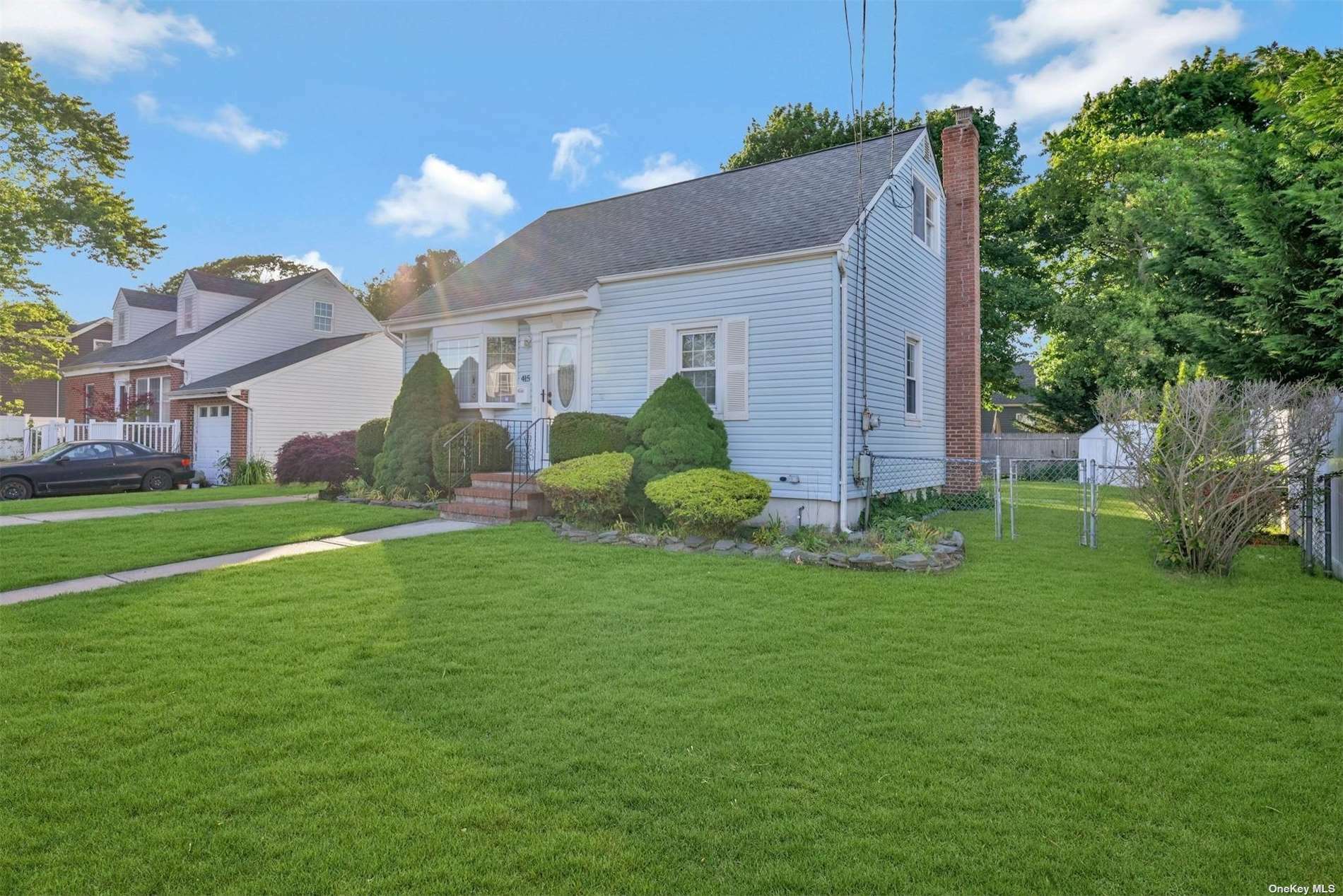 Property Photo:  415 Kensington  NY 11726 