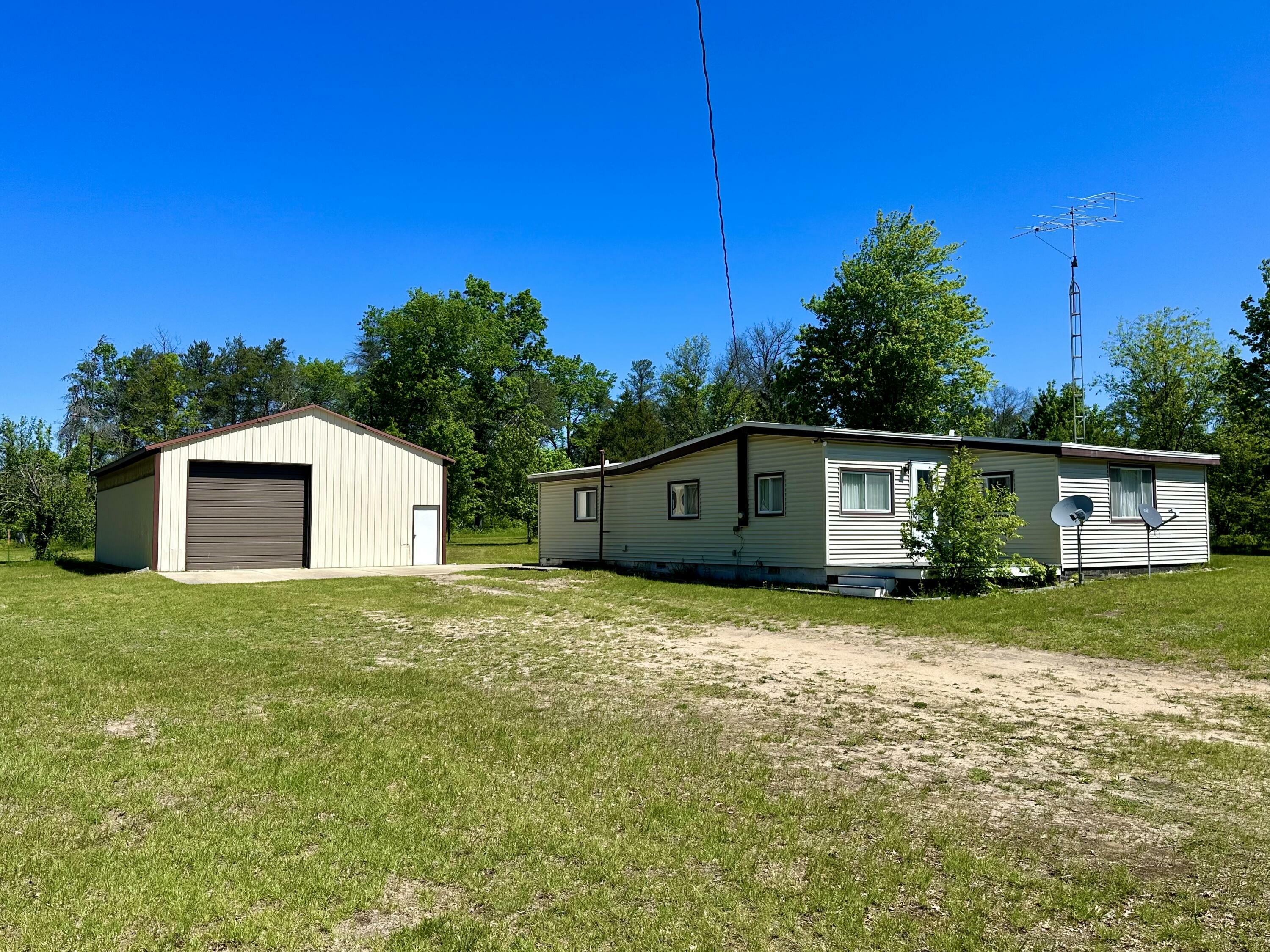 Property Photo:  4952 Wilderness Trail  MI 49738 