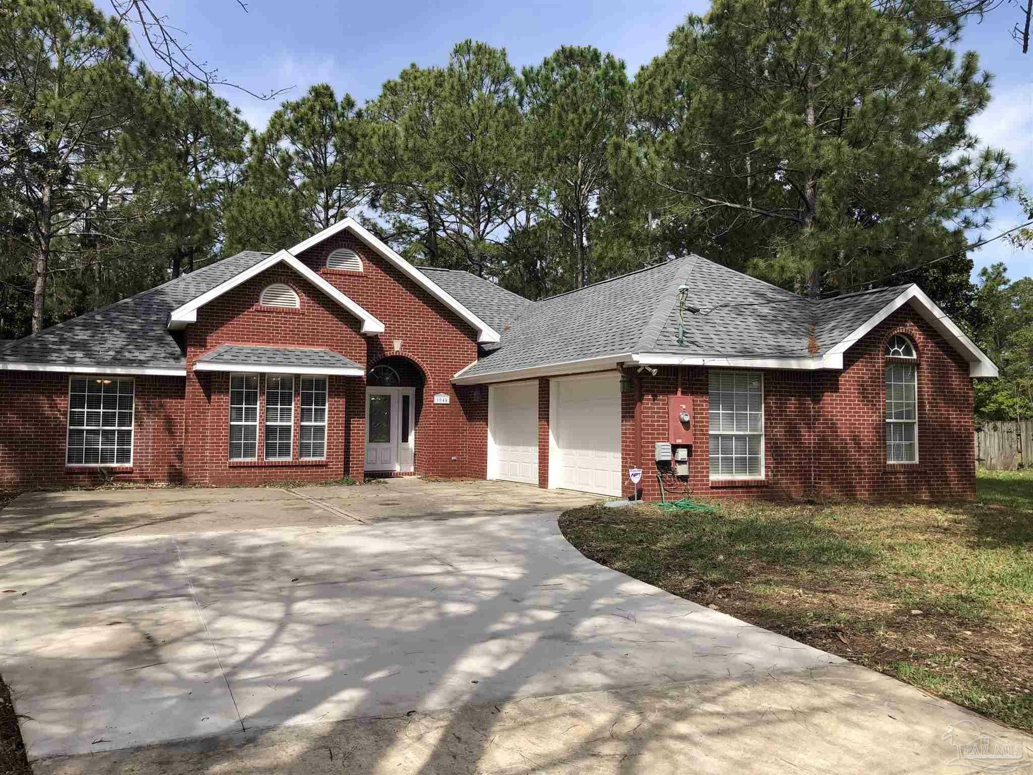 Property Photo:  1044 Woodlore Cir  FL 32563 