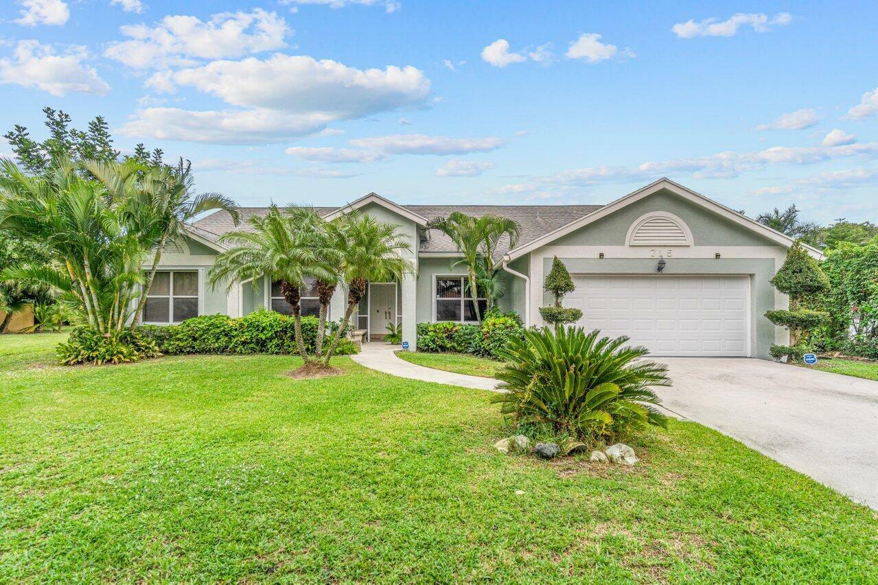 Property Photo:  715 Birdie Court  FL 33445 