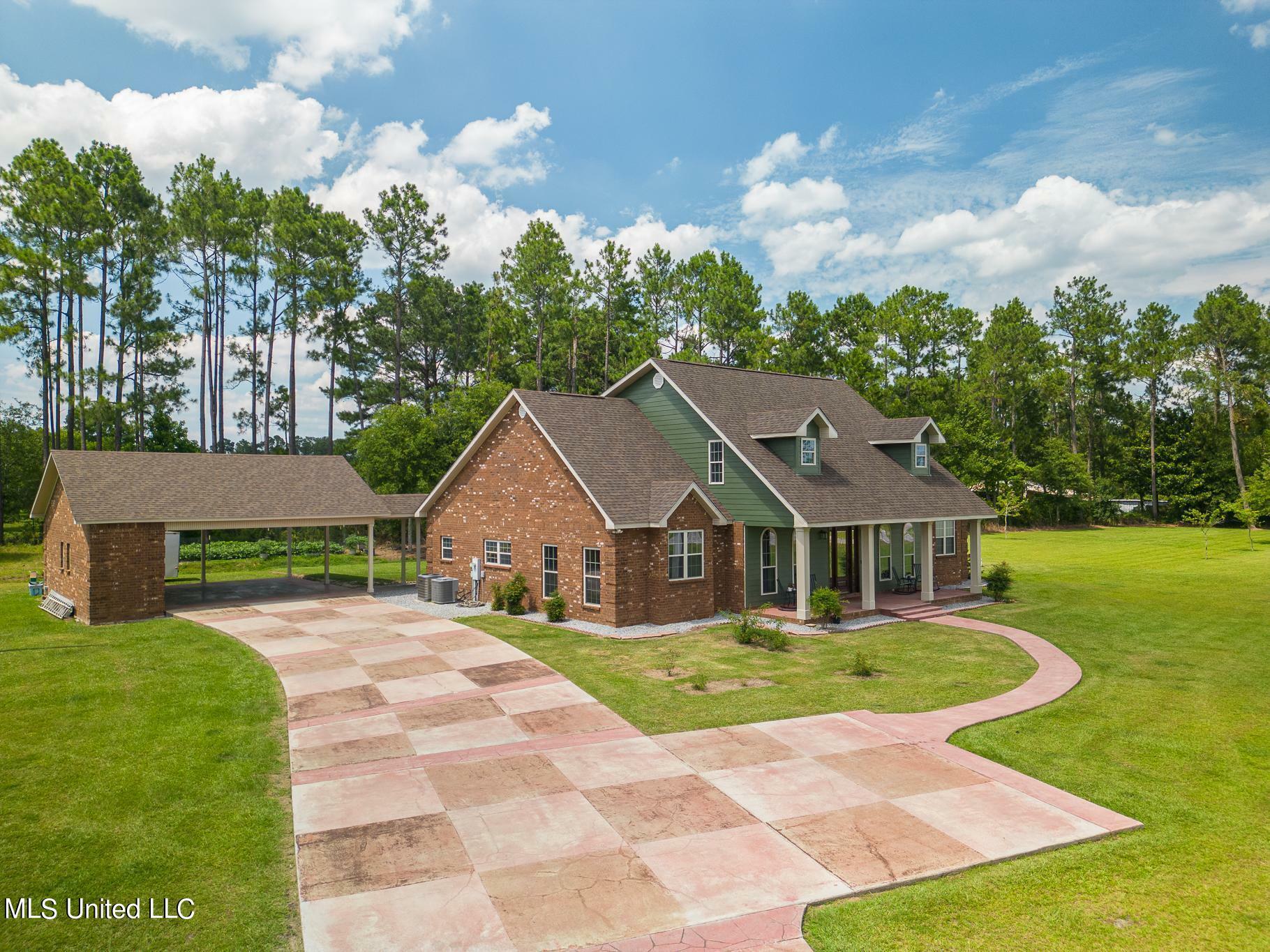 Property Photo: 18339 Ty Valley Drive MS 39574