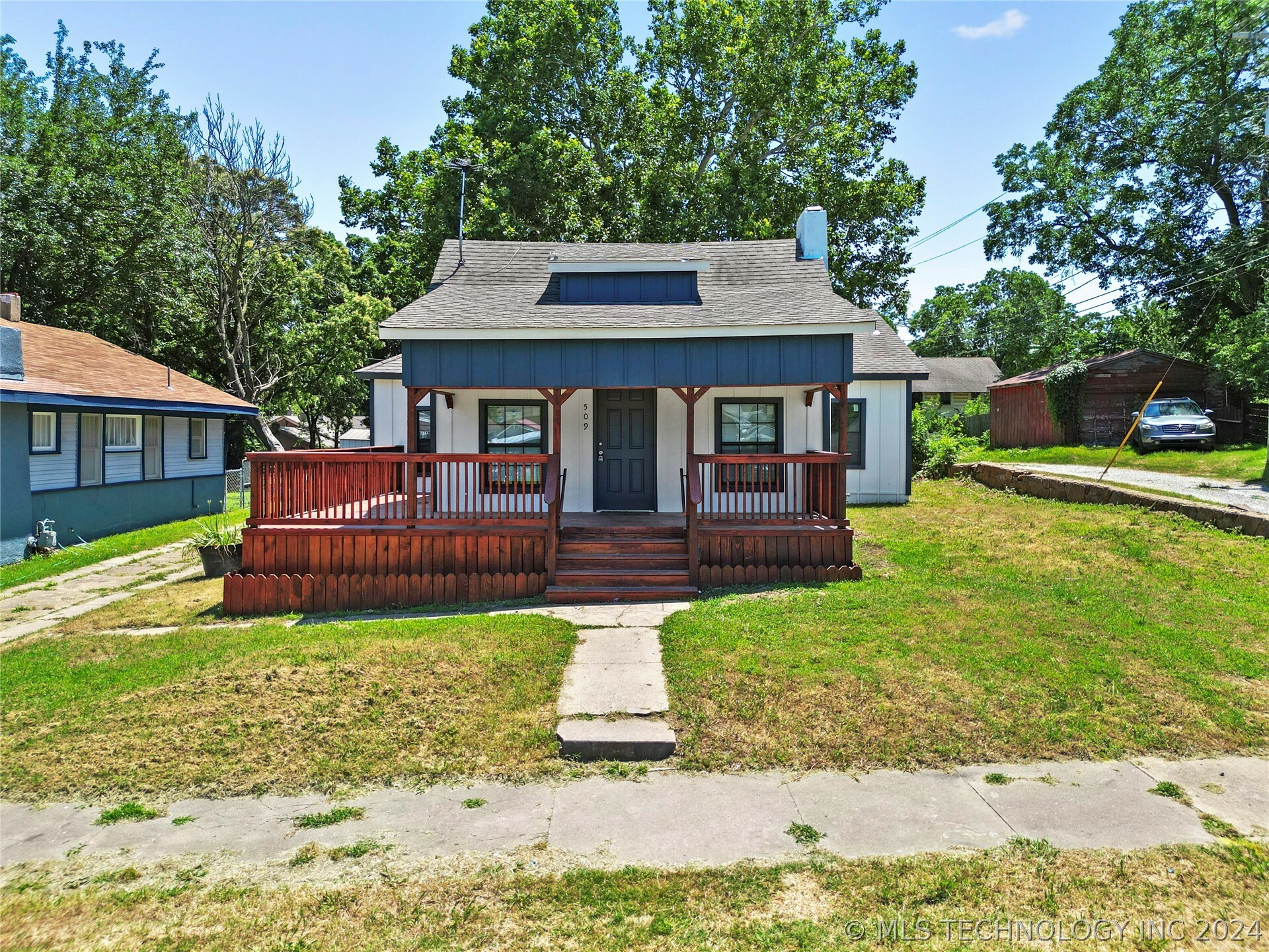 Property Photo:  509 E 12th Street  OK 74003 