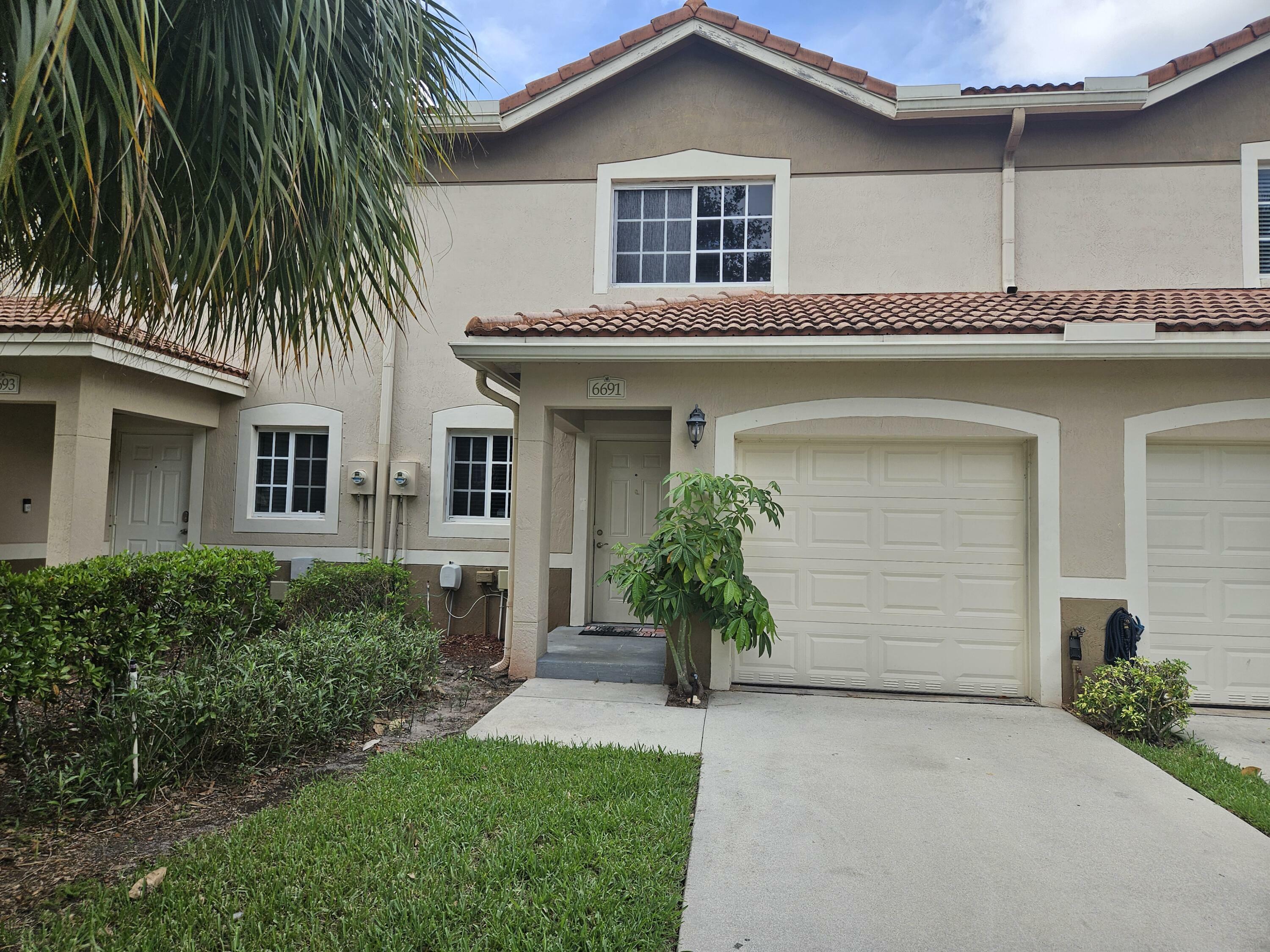 Property Photo:  6691 Old Farm Trail Trail  FL 33437 