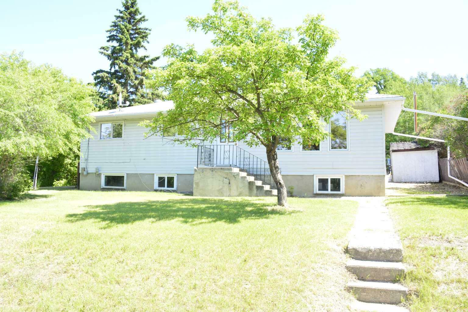 Property Photo:  10812 103A Street  AB T8S 1L5 