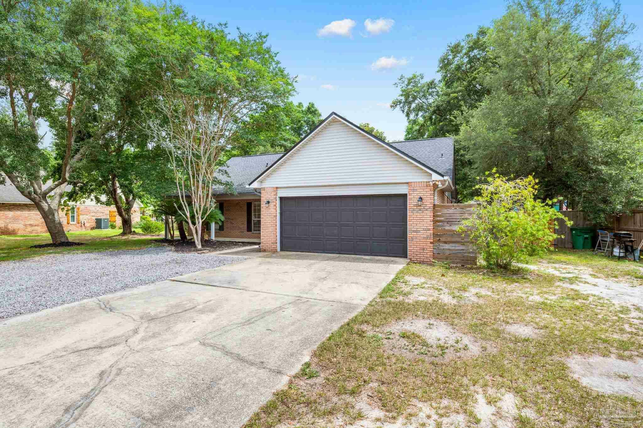 Property Photo:  7040 Lago Mirada Dr  FL 32566 