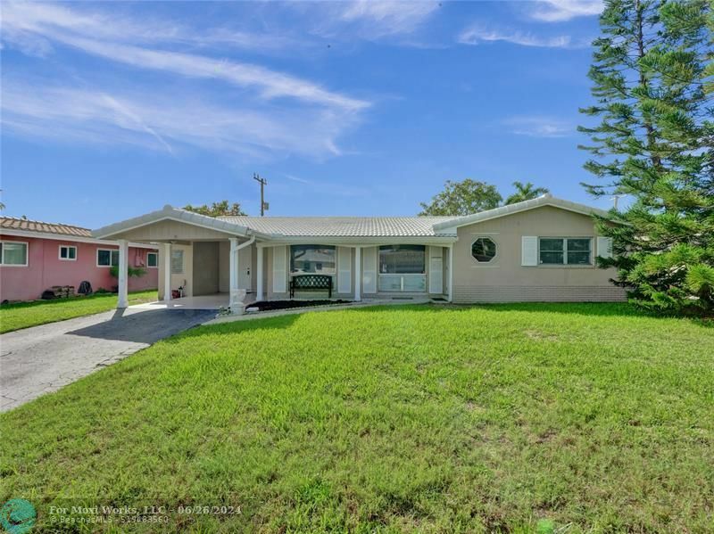 Property Photo:  5860 NE 21st Dr  FL 33308 