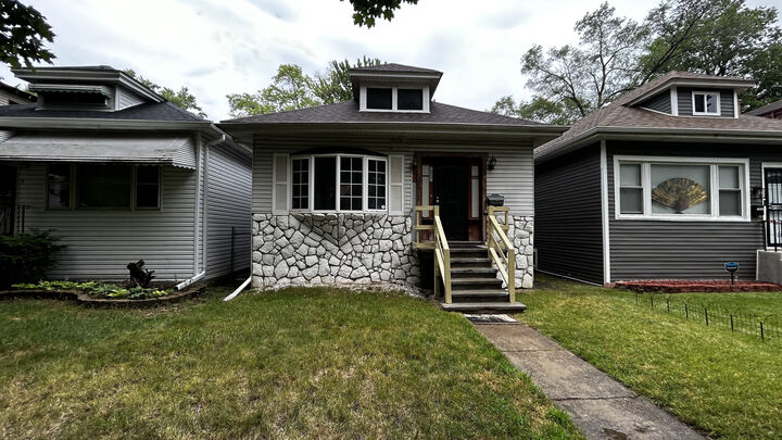 7835 S Oglesby Avenue  Chicago IL 60649 photo