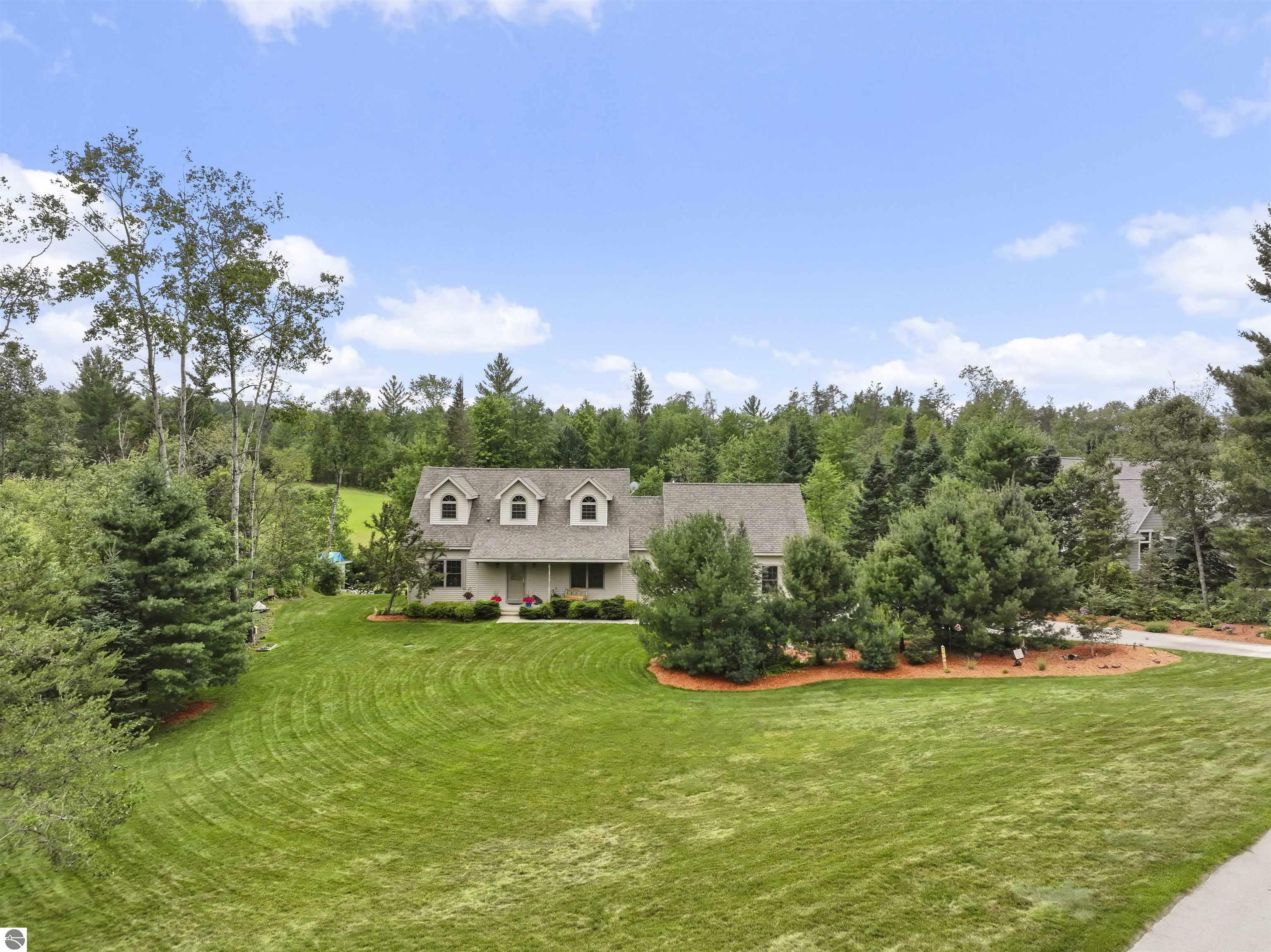 Property Photo:  627 White Pine Drive  MI 49601 