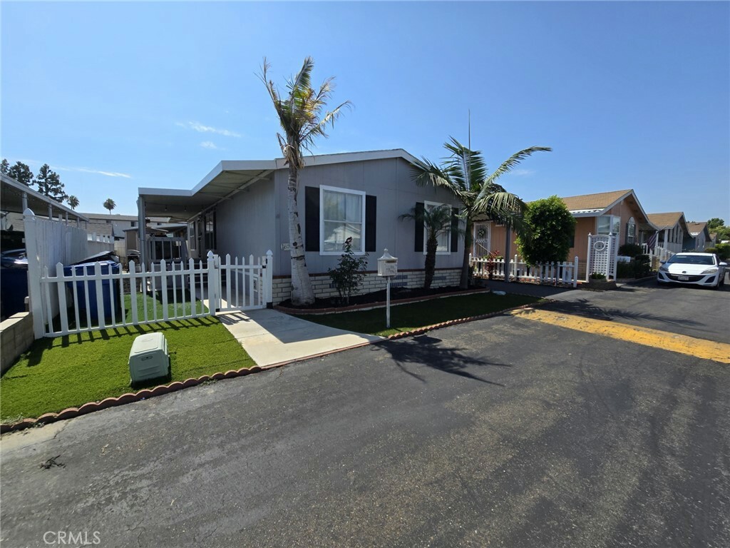 Property Photo:  9080 Bloomfield Avenue 67  CA 90630 