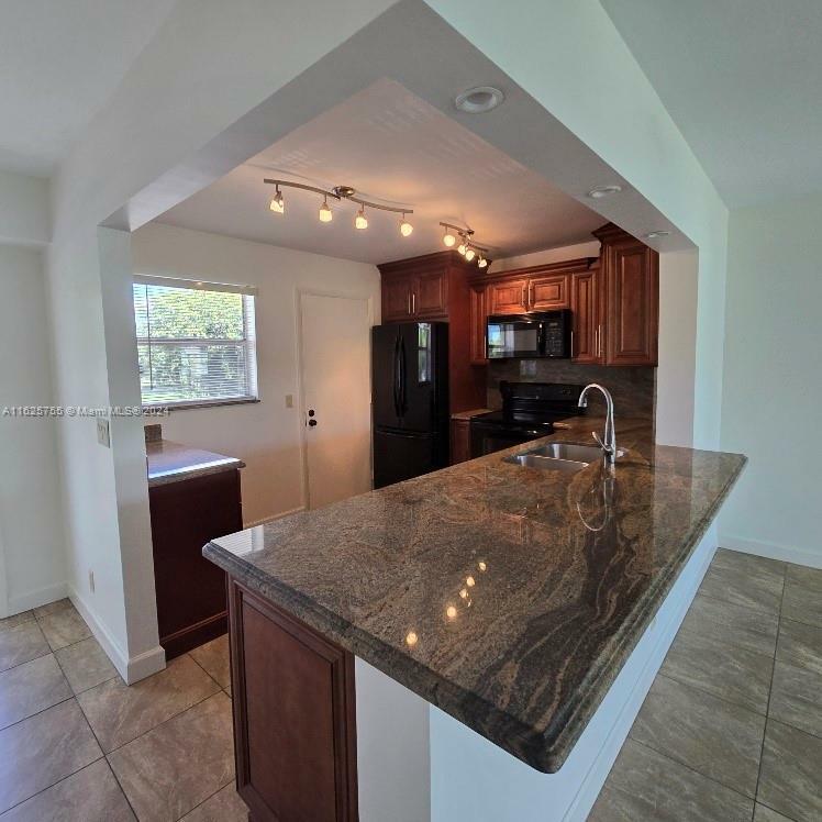 Property Photo:  205 SE 11th Ter 202  FL 33004 