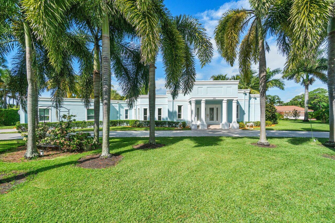 Property Photo:  301 N Country Club Drive  FL 33462 