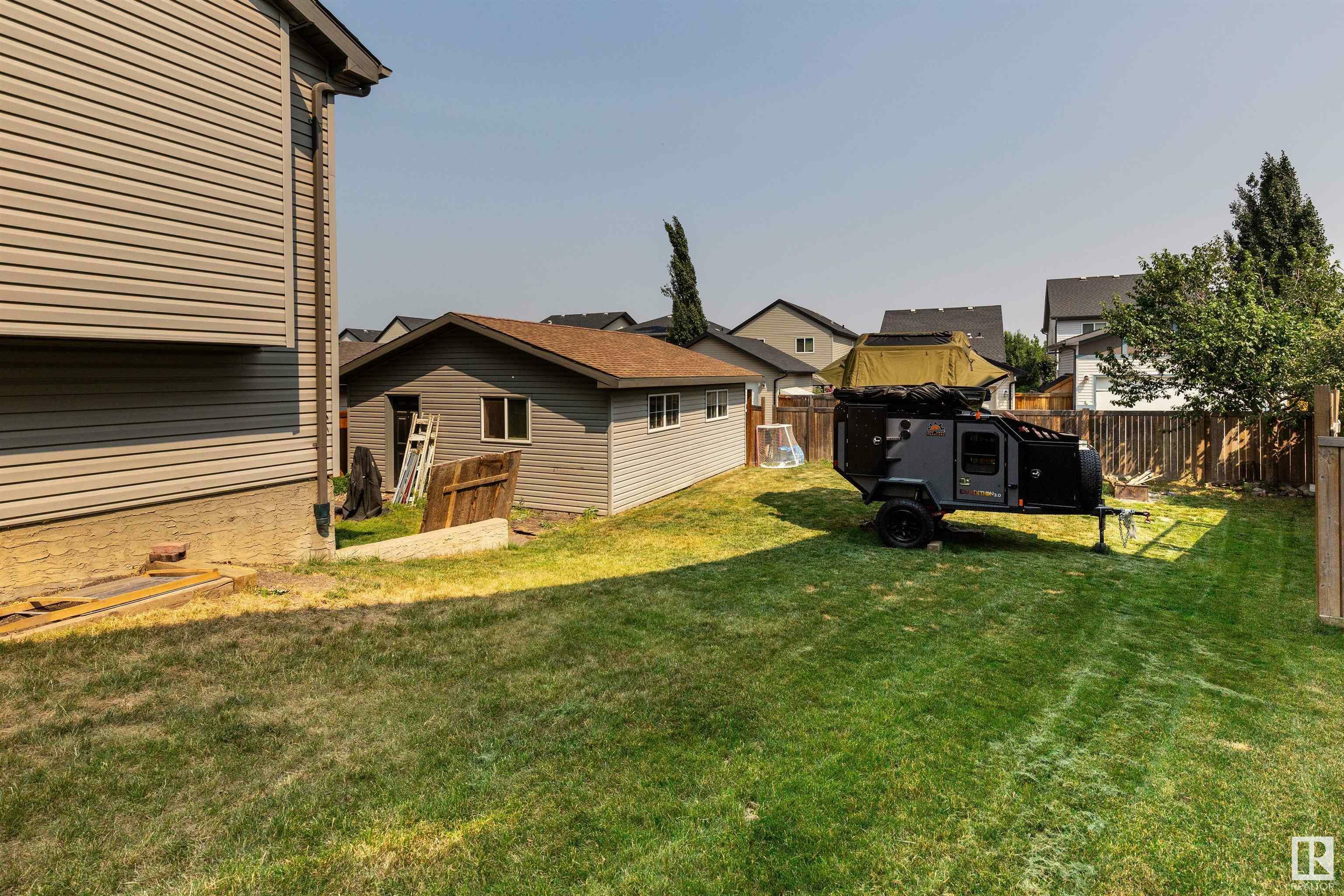 Property Photo:  9707 221 Street NW  AB T5T 4H7 