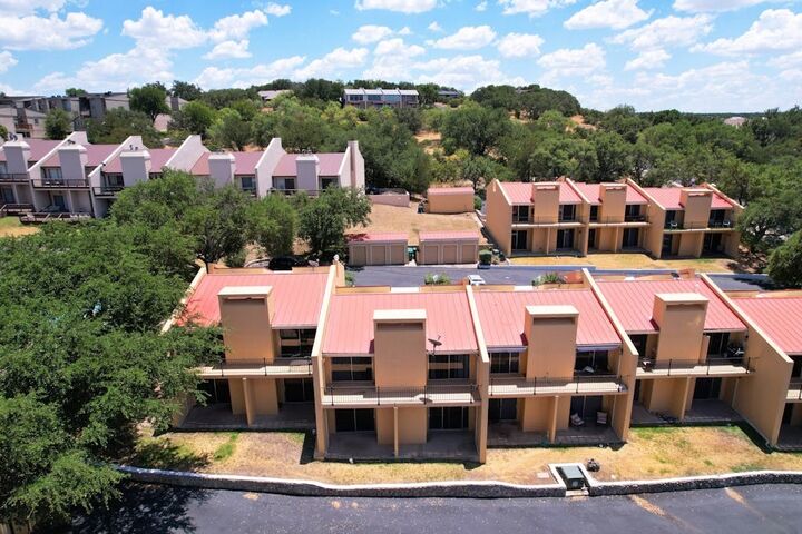 Property Photo:  402 Hi Stirrup E4  TX 78657 