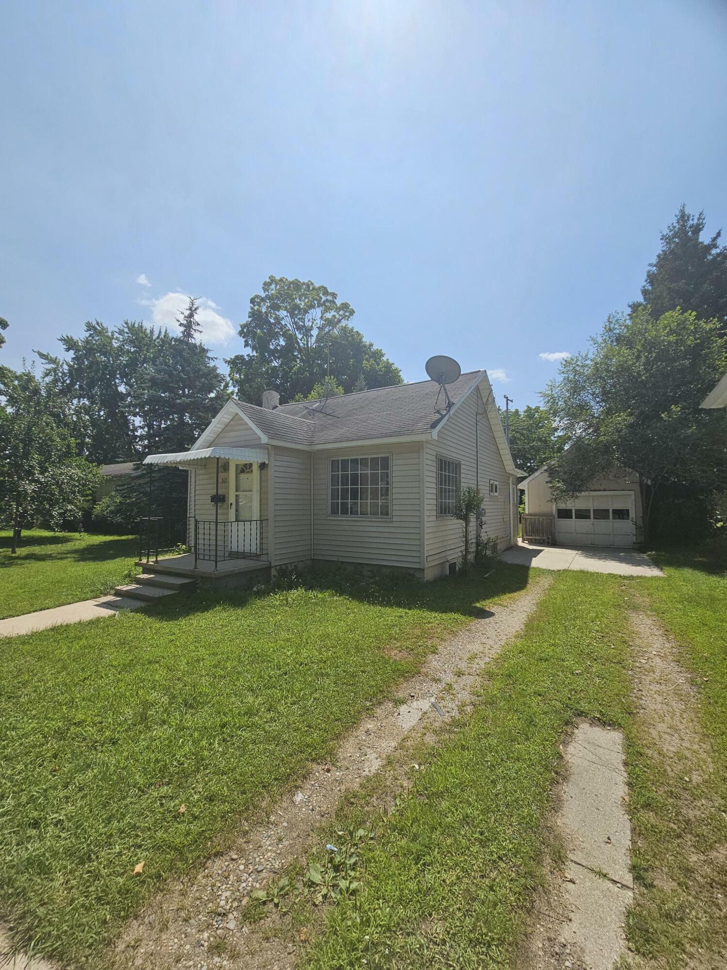 Property Photo:  317 N 3rd Avenue  MI 49307 