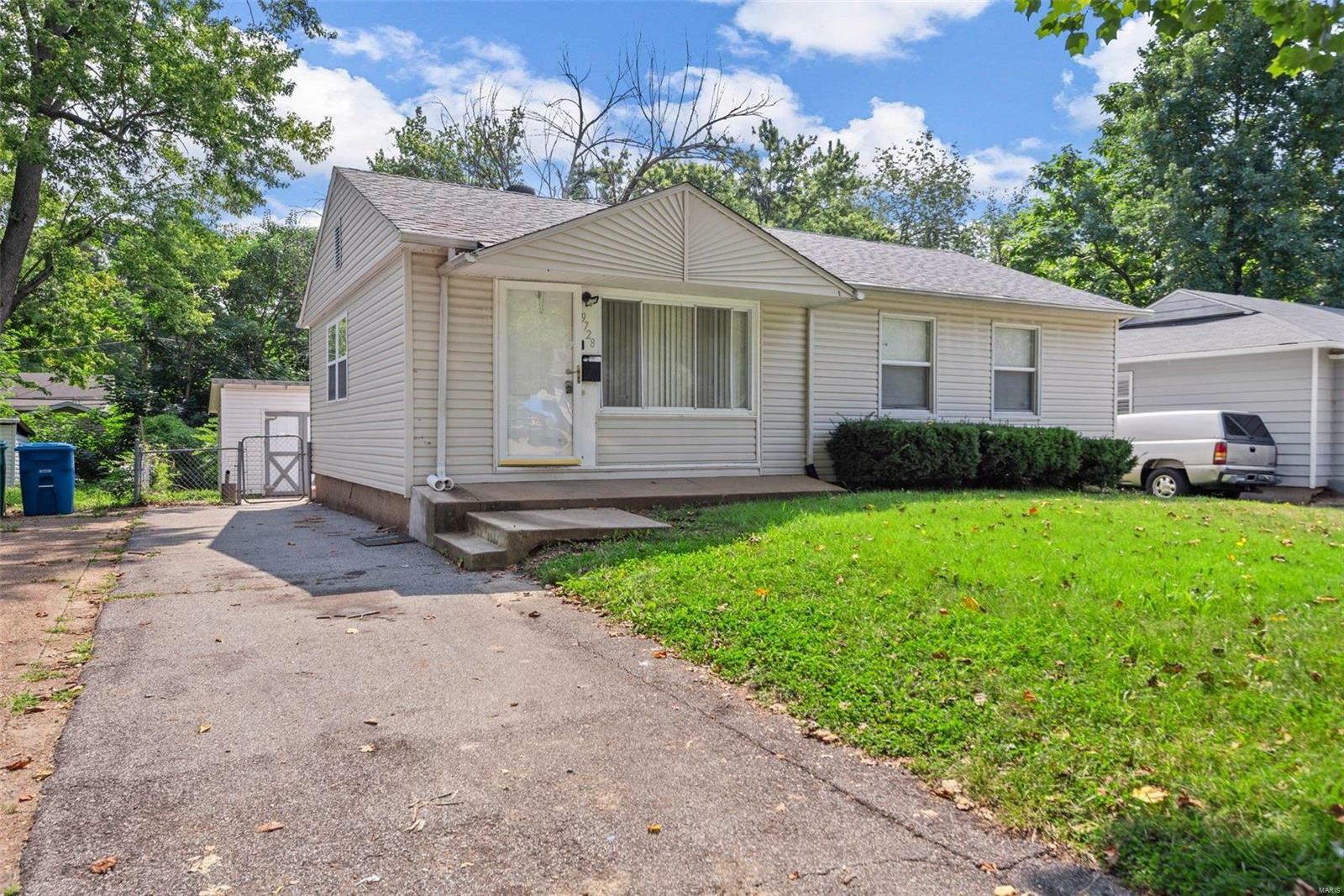 Property Photo:  9728 Medford Drive  MO 63136 