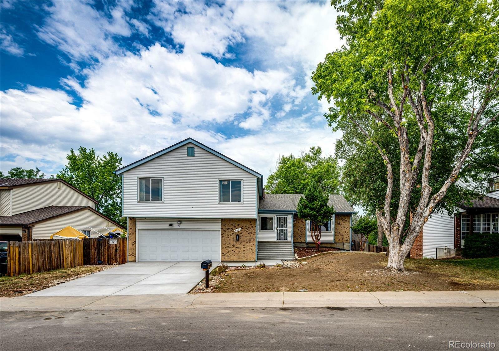 Property Photo:  3679 S Zeno Way  CO 80013 