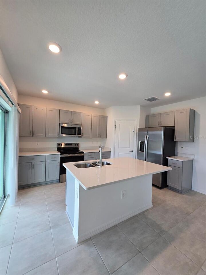 Property Photo:  1348 Axel Graeson Avenue  FL 34744 