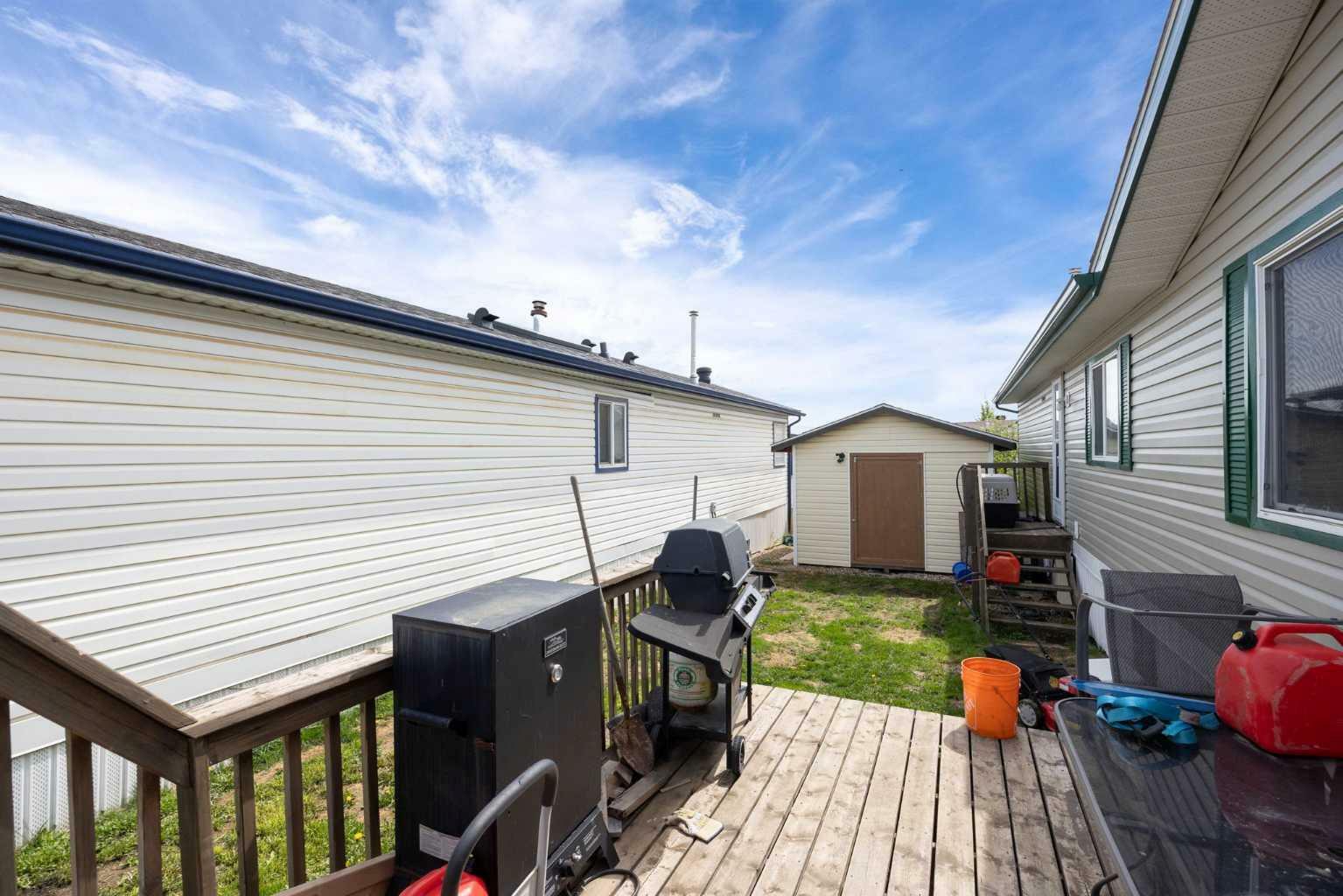 Property Photo:  209 Waterhouse Street  AB T9K 2T1 