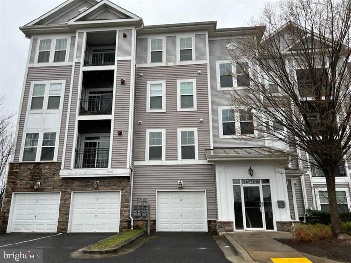 Property Photo:  1341 Karen Boulevard 202  MD 20743