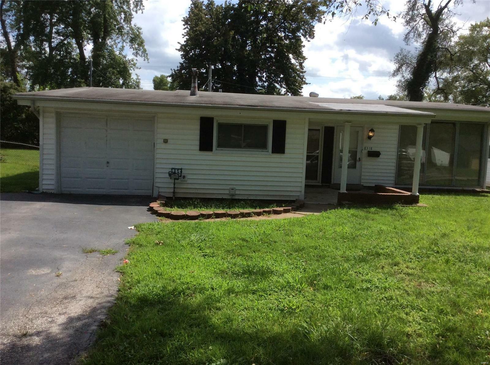 Property Photo:  8318 Woodhurst Drive  MO 63134 