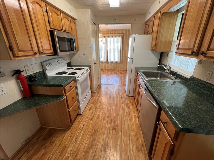 Property Photo:  84 Red Fox Run 7  FL 34695 