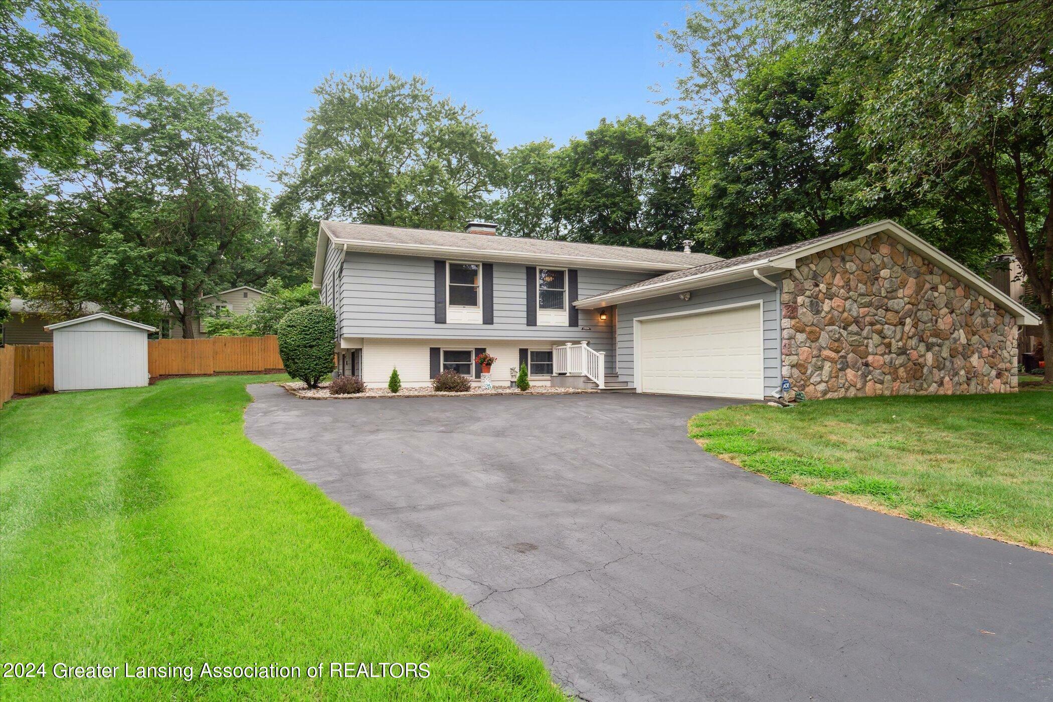 Property Photo:  4383 Stoneycroft Drive  MI 48864 