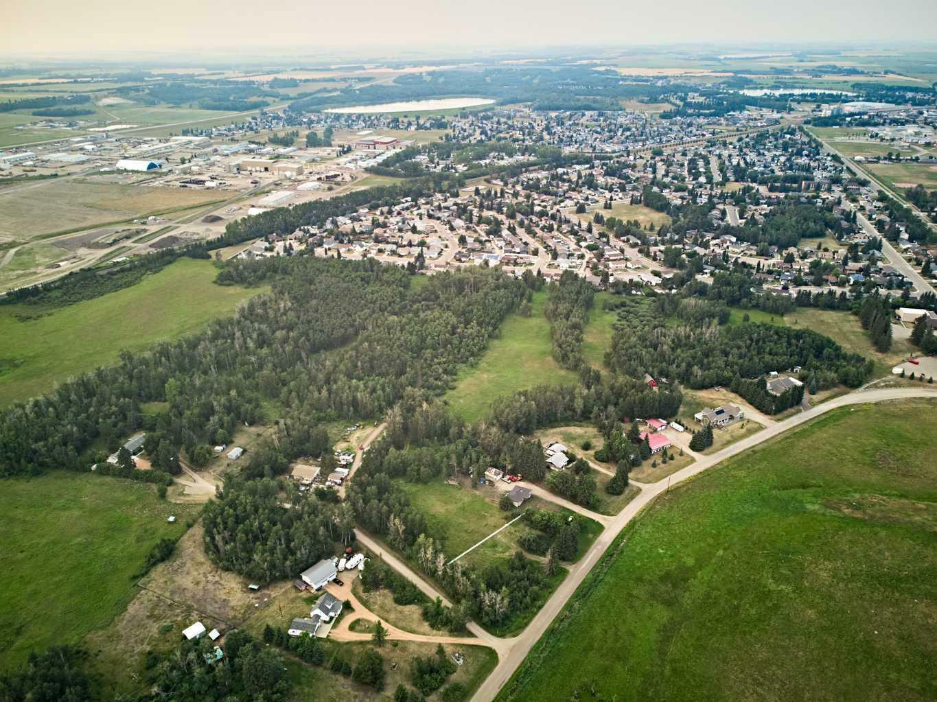 Property Photo:  5260 Woodland Road #Lot 6  AB T4G 1E3 