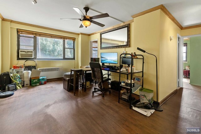 Property Photo:  6515 Kennedy Boulevard 1 F  NJ 07093 