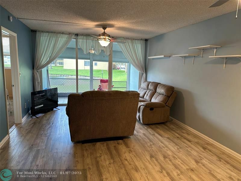 Property Photo:  6091 NW 61st Ave 104  FL 33319 