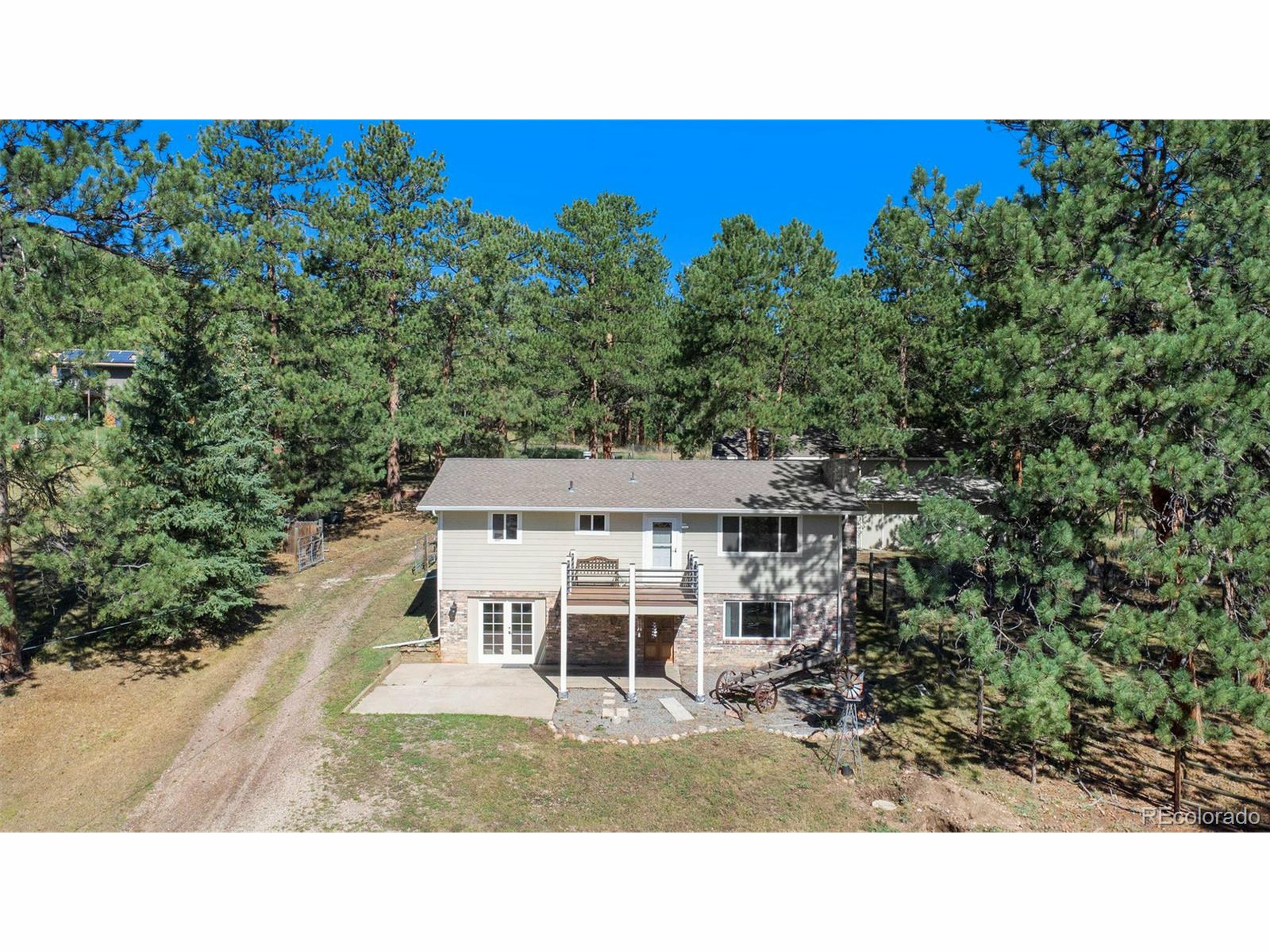 Property Photo:  5761 Cliff Rd  CO 80439 