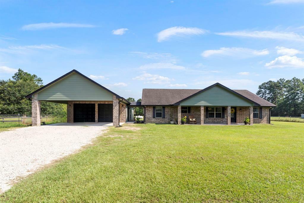 Property Photo:  194 County Road 2293  TX 77327 