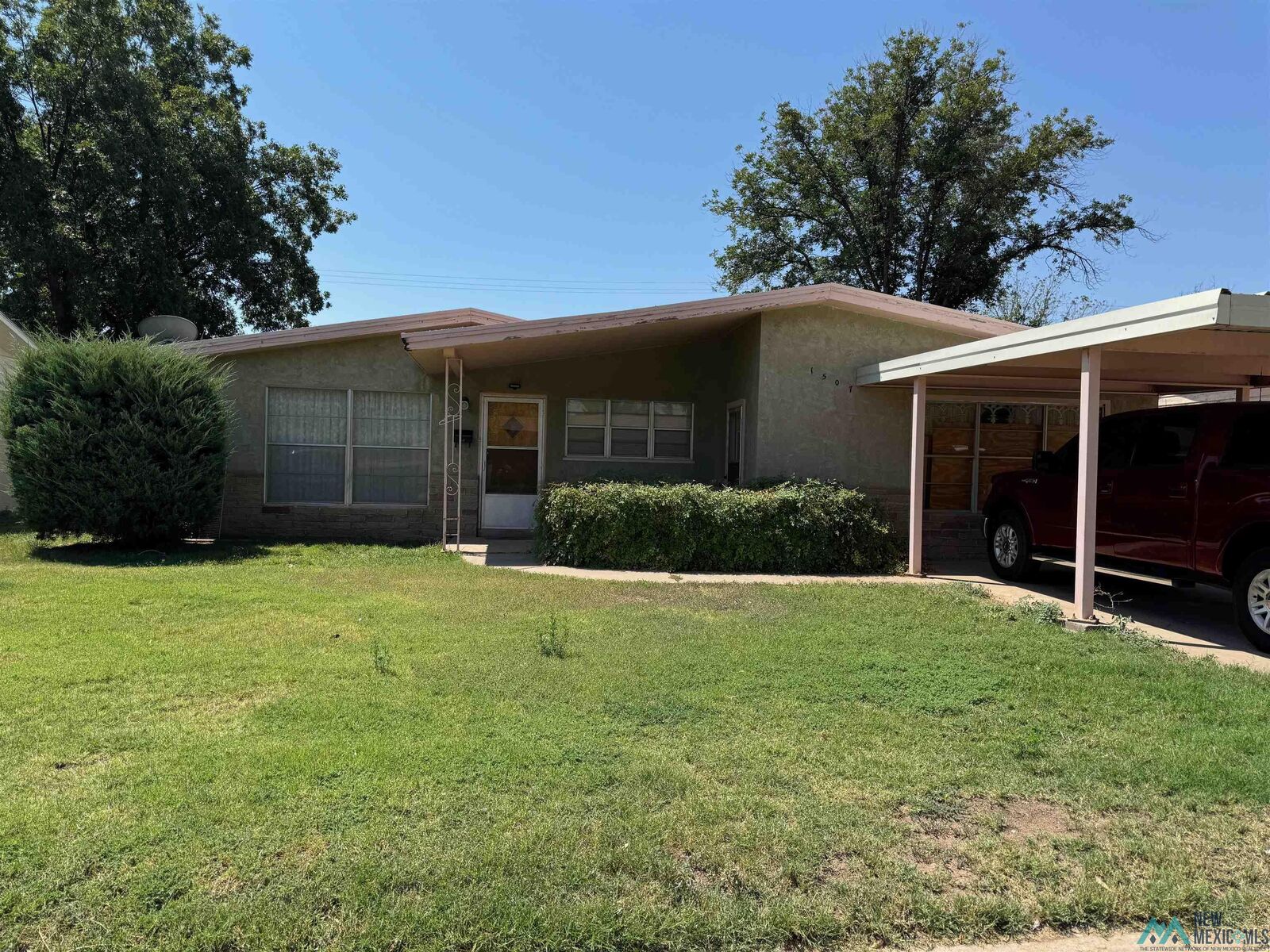 Property Photo: 1507 W Ray Ave Avenue NM 88210