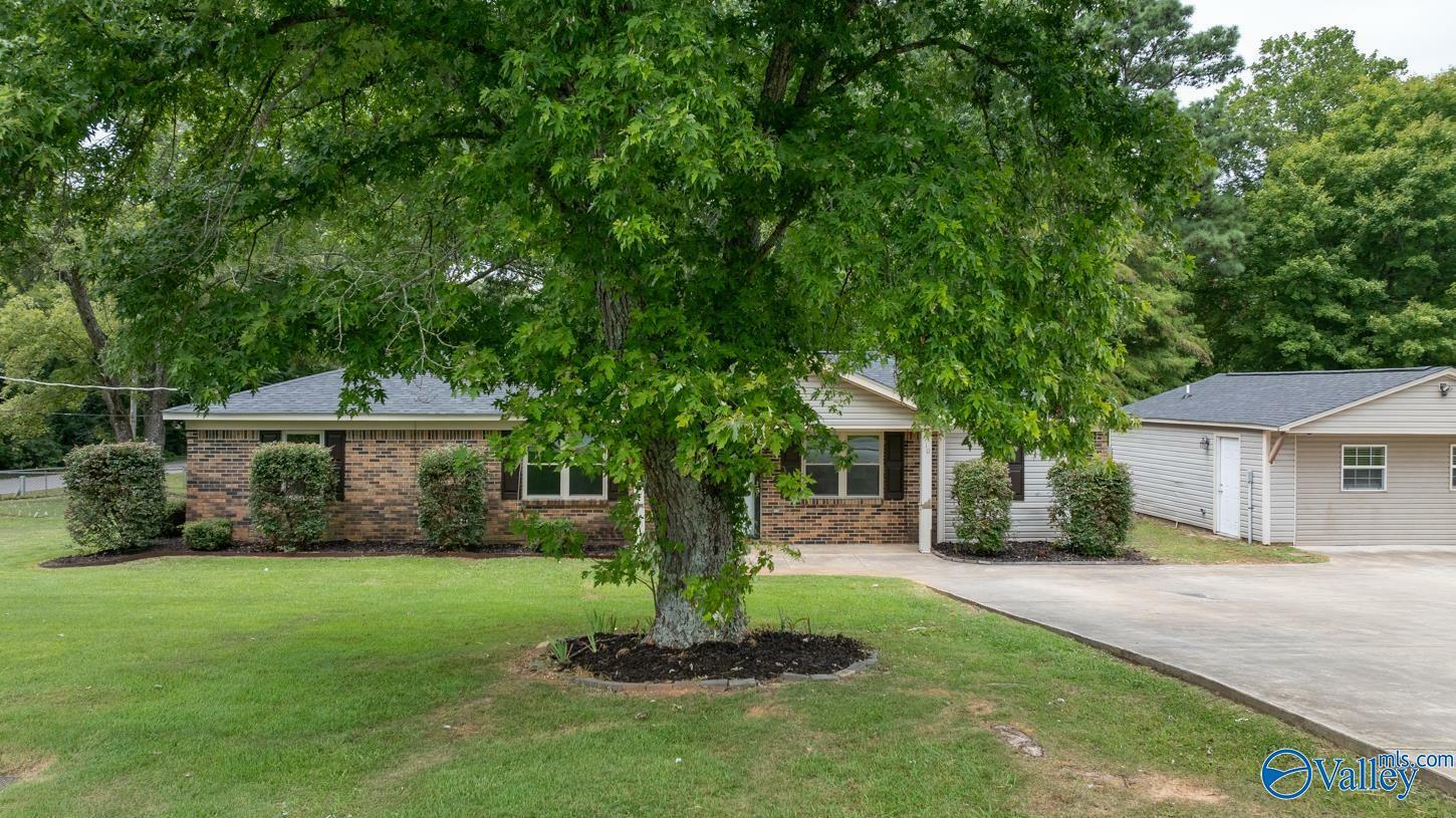 Property Photo:  910 Moontown Road  AL 35741 