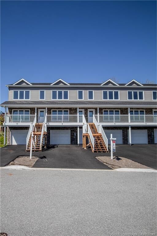 Property Photo: 6 Rockingstone Drive NB E2M 0B5