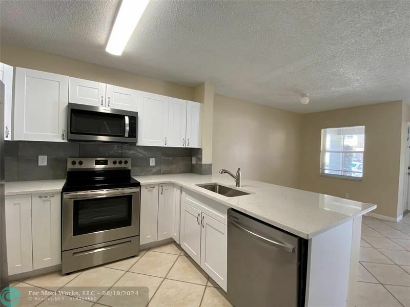 Property Photo:  12646 SW 54th Ct  FL 33027 