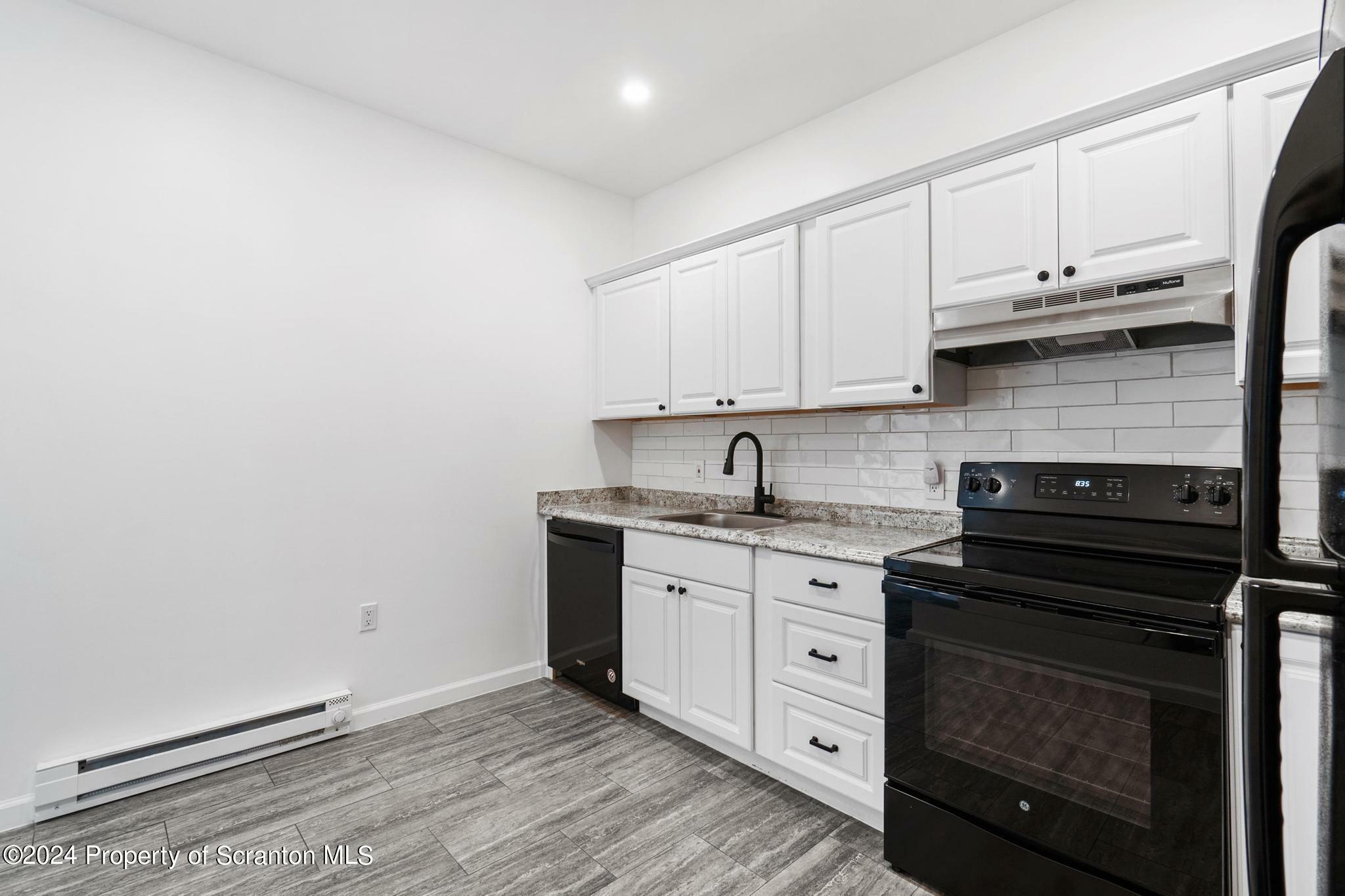 Property Photo:  305-311 N Main 1  PA 18504 