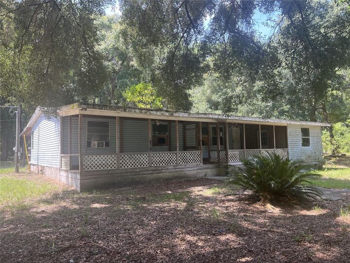 Property Photo: 23848 NE 120th Place FL 32134