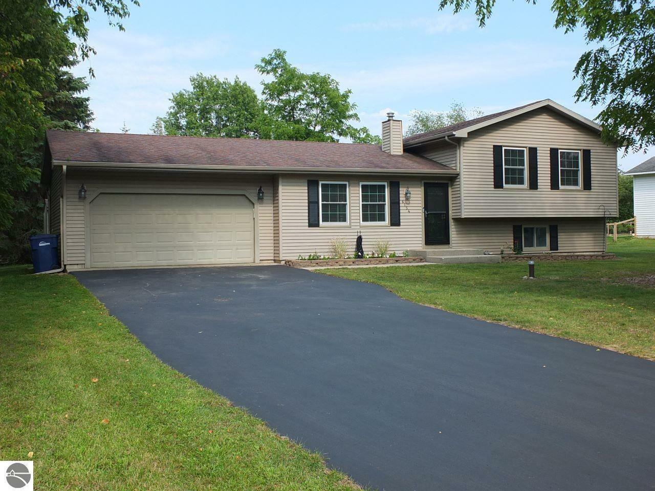 Property Photo:  6154 Lillian Lane  MI 49685 