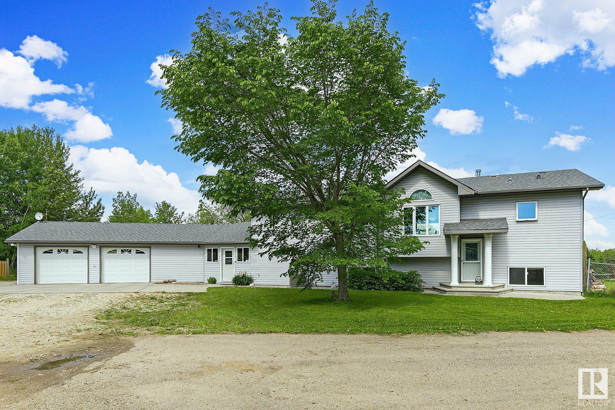 Property Photo:  53213 Rge Rd 20  AB T7Y 0C4 